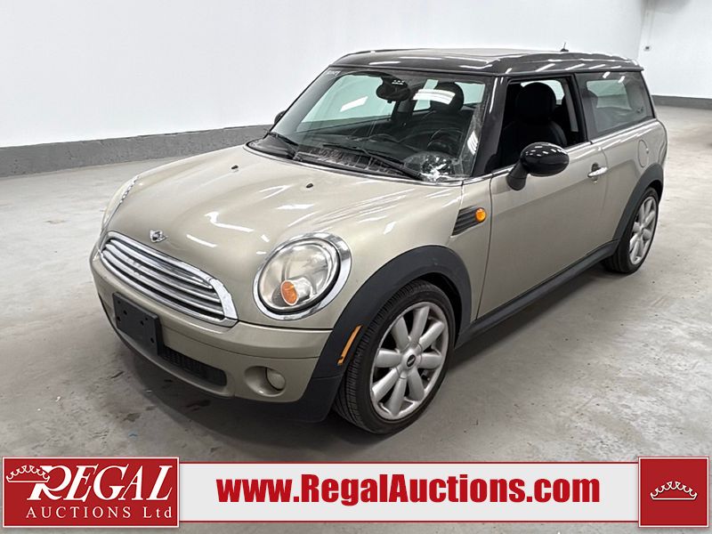 Gold 2009 MINI Cooper Clubman Wagon Front-Wheel Drive 6-Speed Automatic